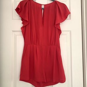 BCBG Maxazria Blood orange romper with cap sleeves